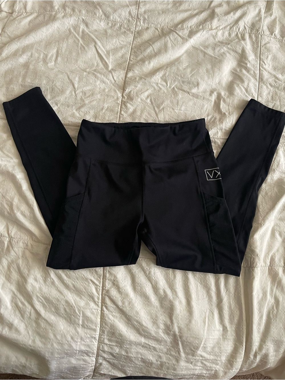 Vixxon by Dixxon flannel black leggings with pockets. Size 8 women’s